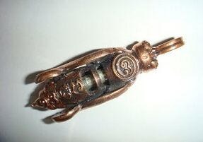 malý amulet přinášející štěstí